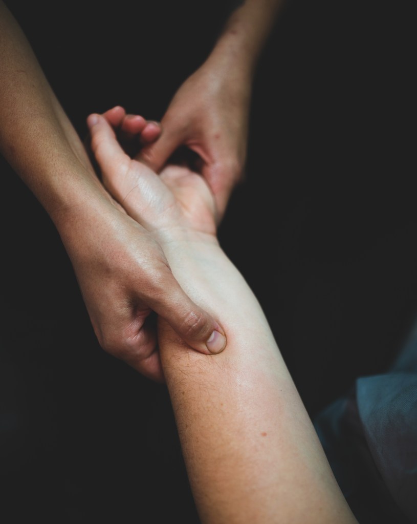 This is an image of the therapeutic massage therapist giving a client a massage in Plymouth, Michigan. This client is getting a therapeutic massage.